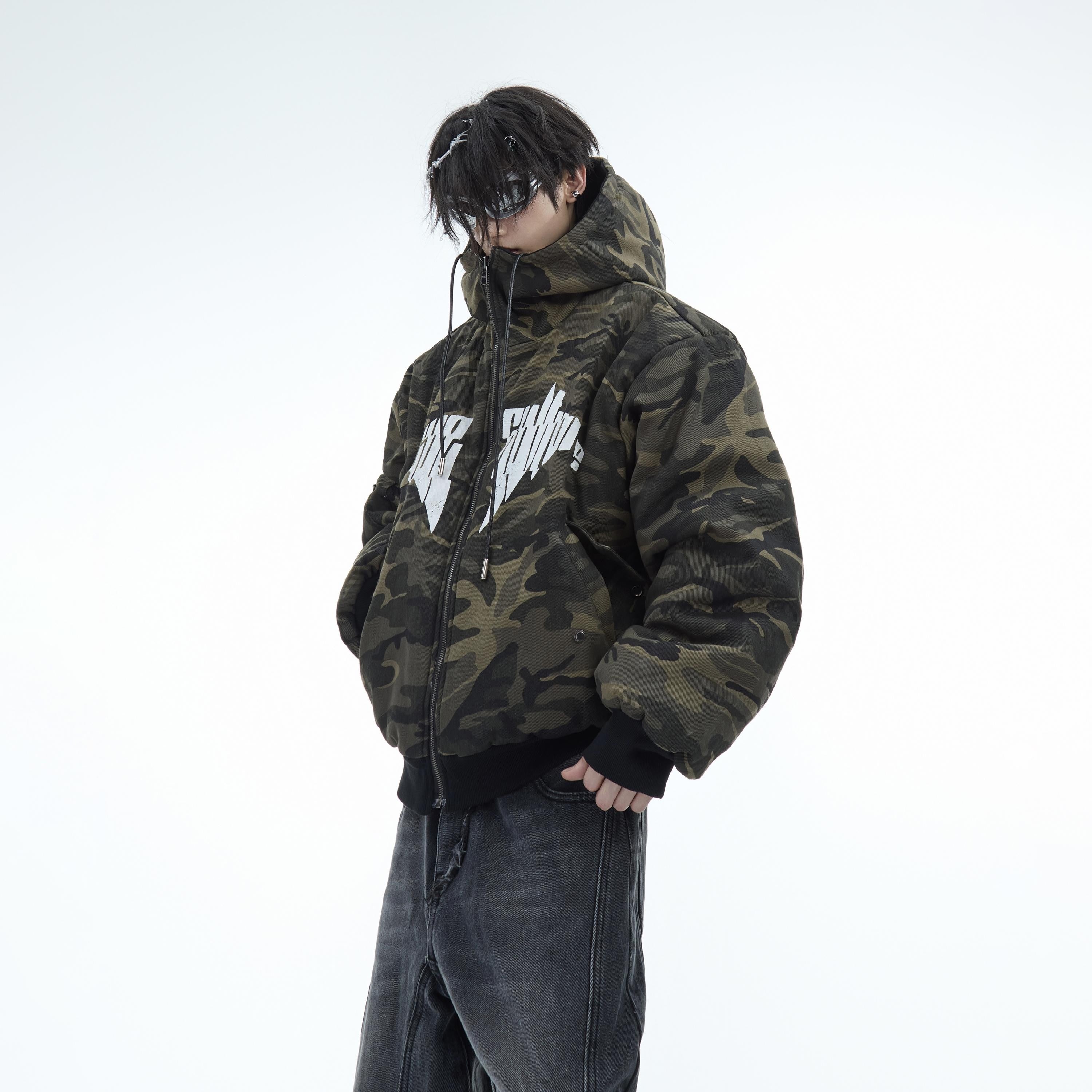 Reversible side of men's oversized puffer coat showing contrasting streetwear design with bold logo prints