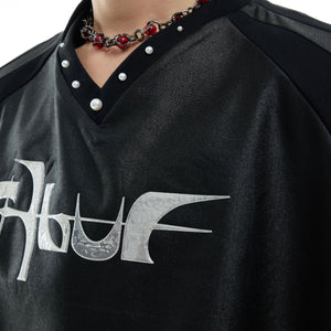 Side view of unique deconstructed streetwear tee showing asymmetrical hem and premium stitching