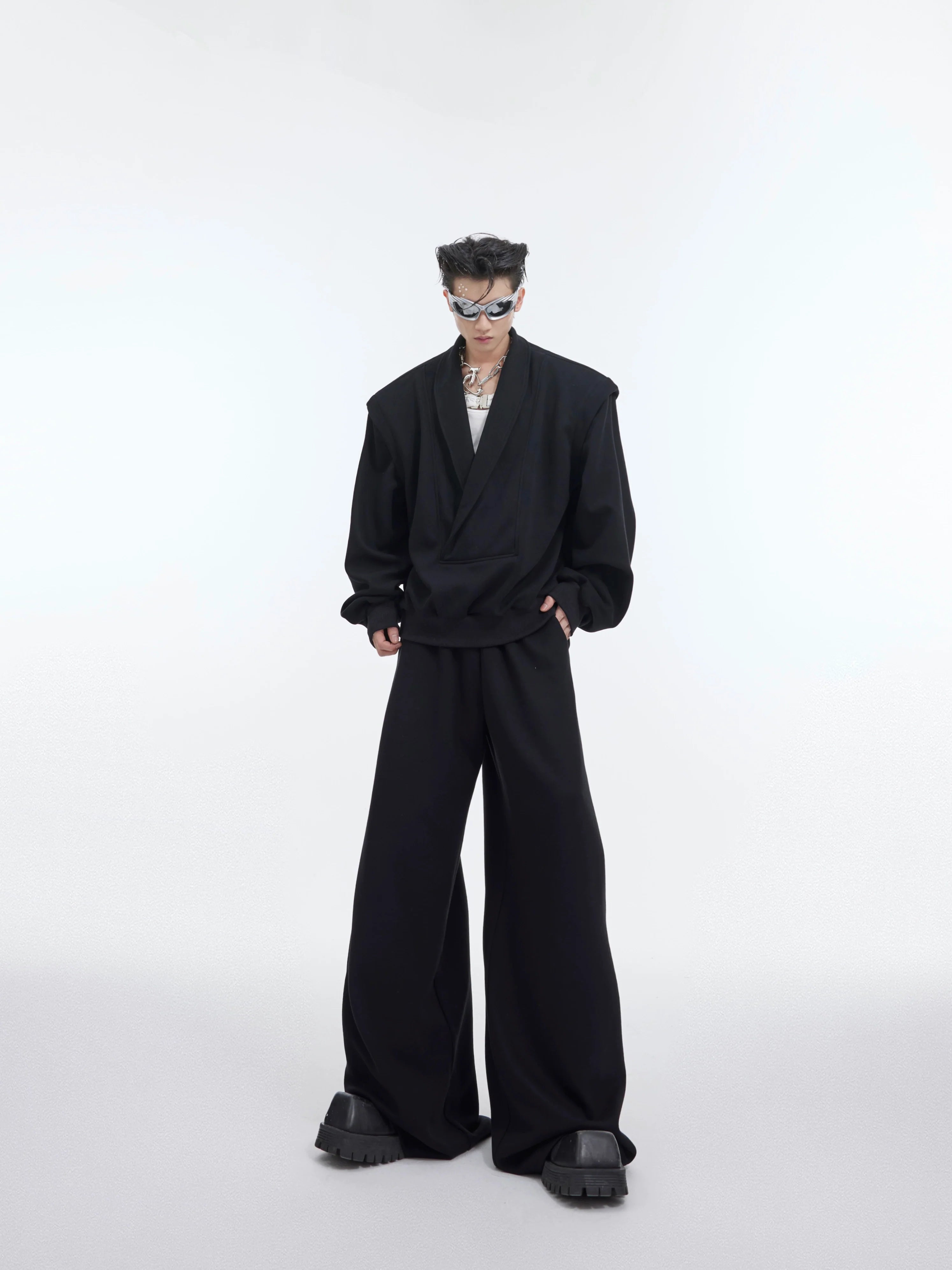 Front view of oversized V-neck hoodie set with stylish metal accents, perfect for spring streetwear looks