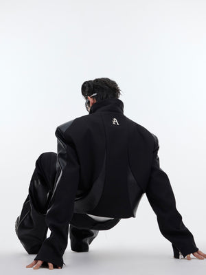 Detailed back view of patchwork short suit highlighting the raw streetwear aesthetic and unique construction