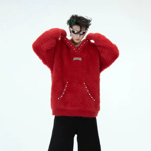 Front view of oversized fuzzy sweatshirt with elegant pearl trim detailing, perfect for streetwear fashion