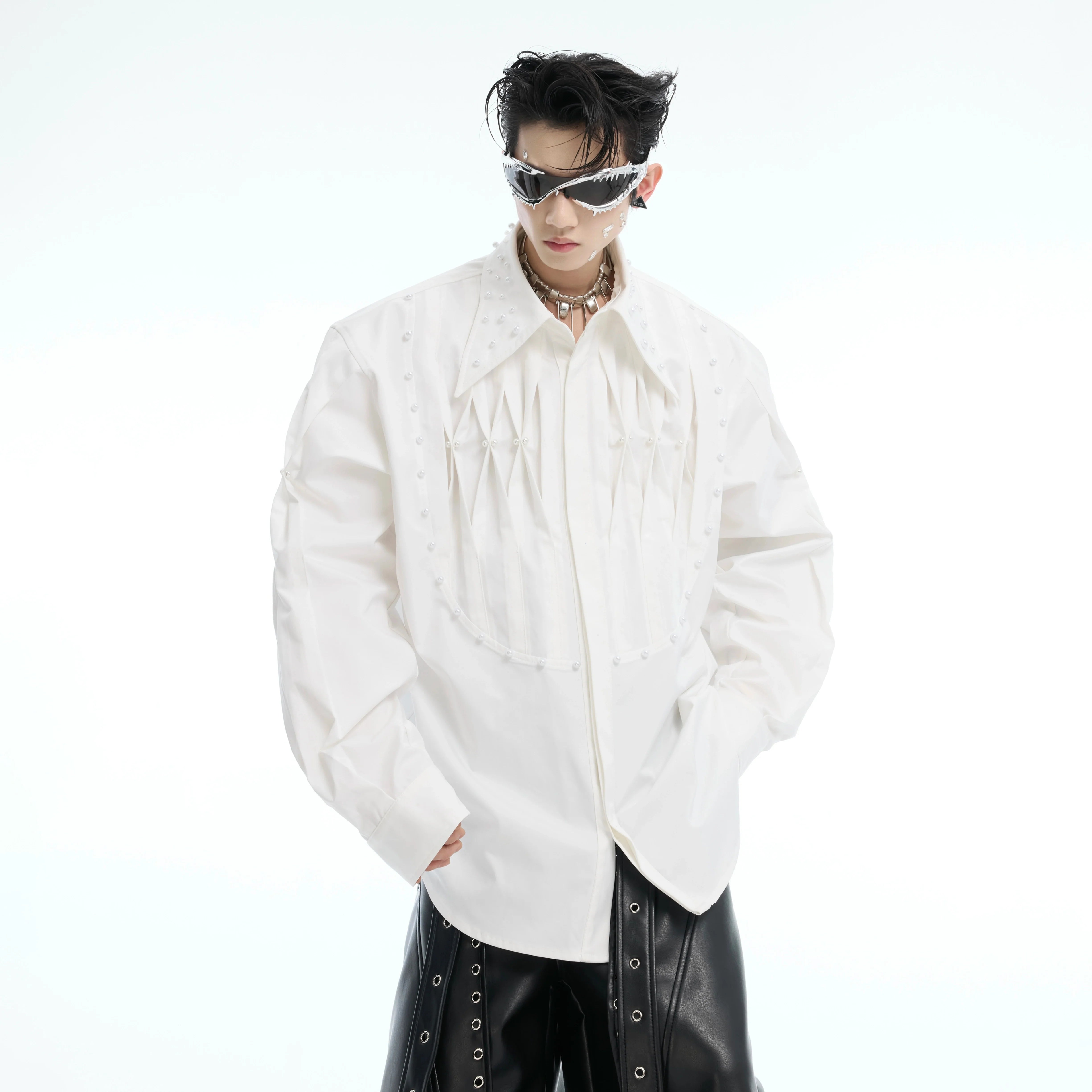 Front view of deconstructed pearl-trimmed oversized shirt, a must-have streetwear essential with unique embellishments