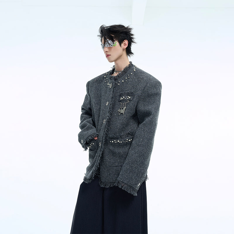 Front view of pearl-trimmed tweed jacket with glitter details, showcasing the elegant streetwear design