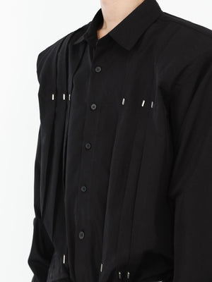 Detail shot showing metal studs on shoulder pad of this high-quality cotton statement shirt