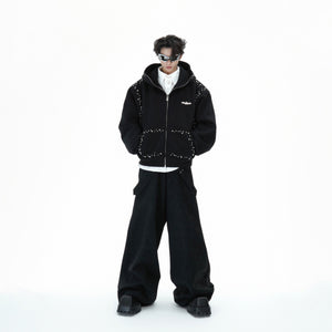 Back view of pearl-trimmed oversized sweatshirt highlighting the elegant streetwear design