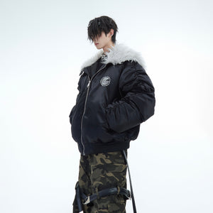 Puffy bomber jacket with embroidered patchwork design, featuring heavyweight streetwear style and plush lining