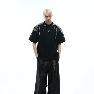 Gold sequin t-shirt showing ripple effect when in motion for dynamic street style