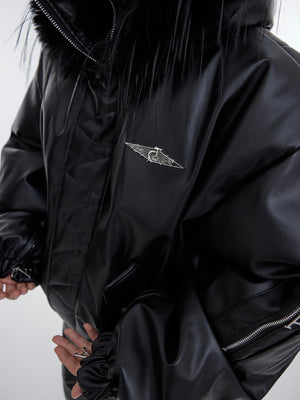 Back view of the rebel streetwear jacket featuring a distinctive oversized fur-trimmed hood