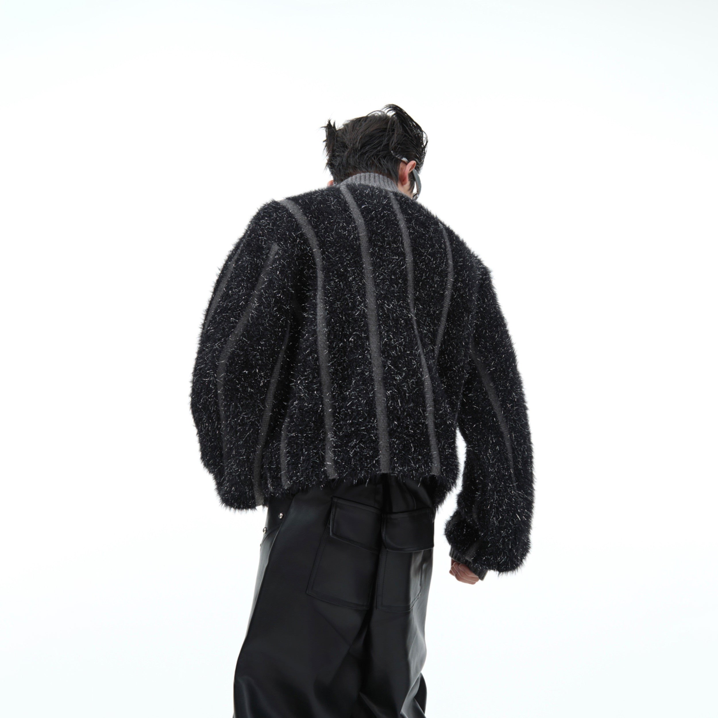 Close-up detail of shimmering silver threads and ultra-soft Arctic fluff on cropped turtleneck sweater