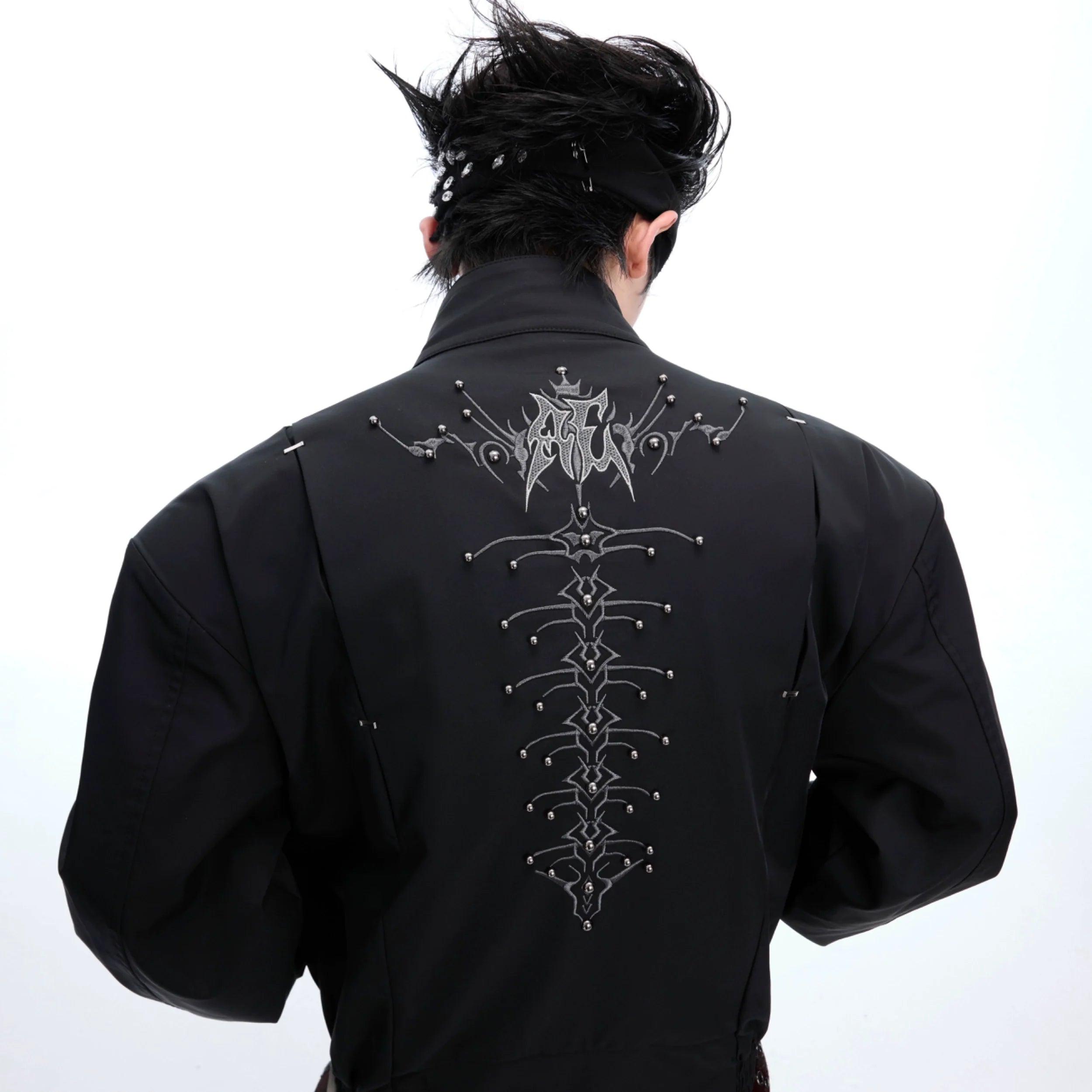 Front view of Snake-Eye Harrington jacket with wide fit studded collar, showcasing avant-garde streetwear design