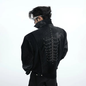 Front view of punk style snakeskin PU leather jacket with metal studs and snake-eye stitch detailing