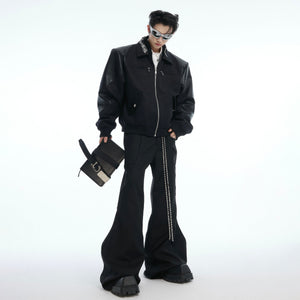 Side profile modeling shot of retro snake print cropped jacket with punk-inspired streetwear aesthetic