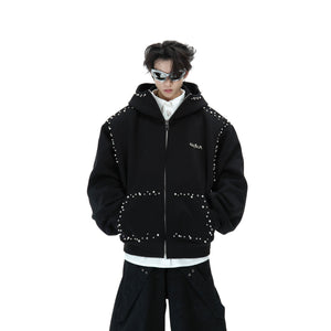 Close-up of pearl detailing on oversized hoodie showcasing the premium cotton-polyester fabric blend