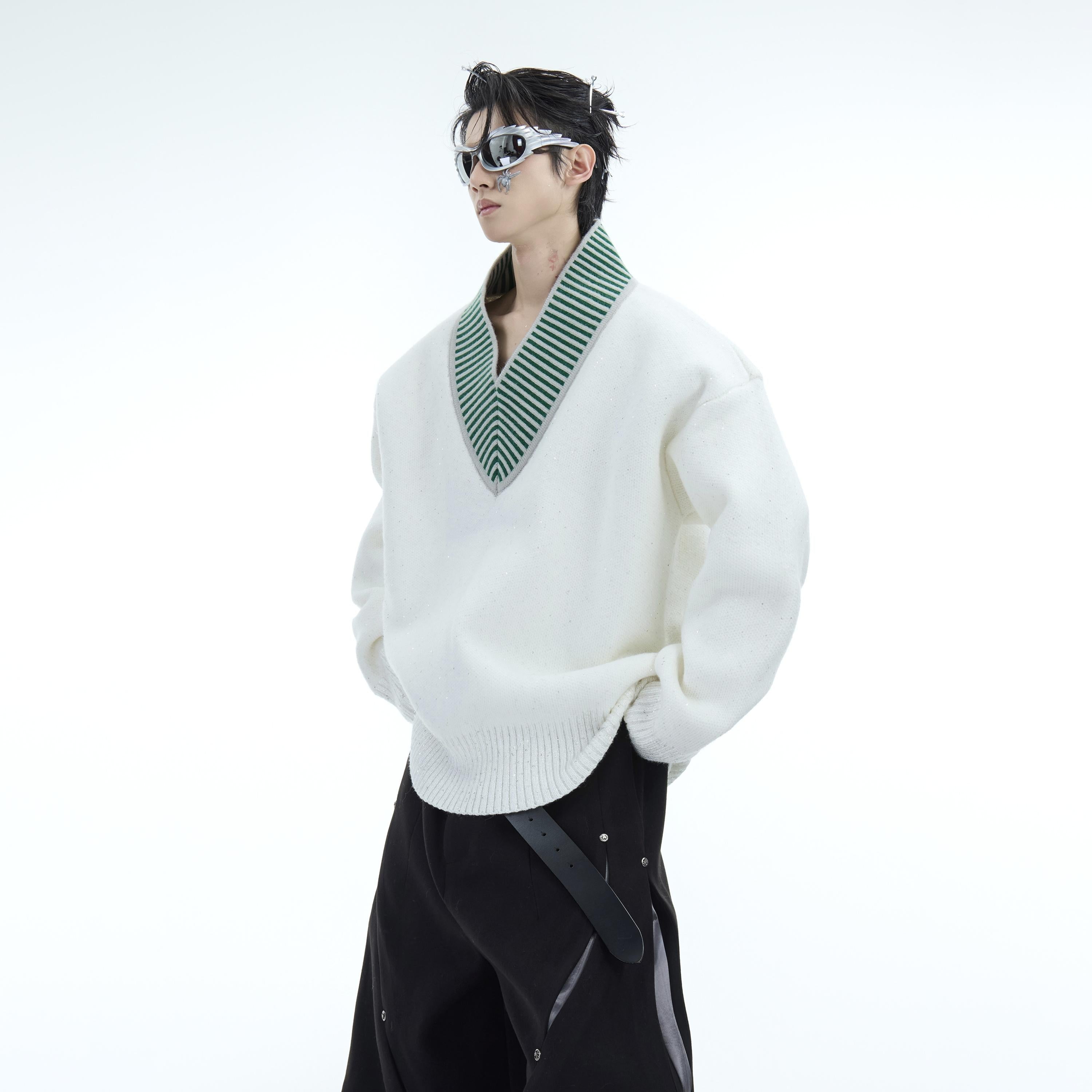 Side view of cozy oversized pullover showing the shimmer effect and textured knit fabric for streetwear style