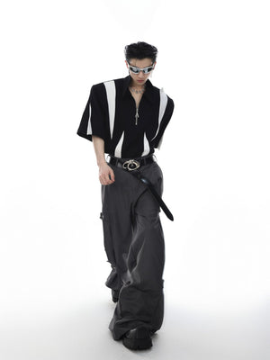 Back view of square neck polo shirt with radical color-blocking design and deconstructed streetwear style