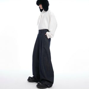 Detailed shot of straight-cut jeans fit showing mixed-material detailing and streetwear style