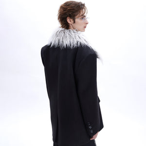 Close-up of urban blazer showing color retention quality and textured wool-lapel construction