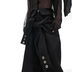 Detail shot showing the crisp, structured fabric texture of these urban style pants