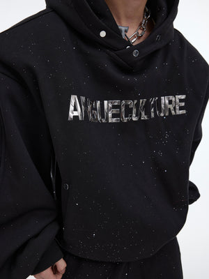Close-up of structured shoulder design on oversized hoodie with fleece lining for urban fashion