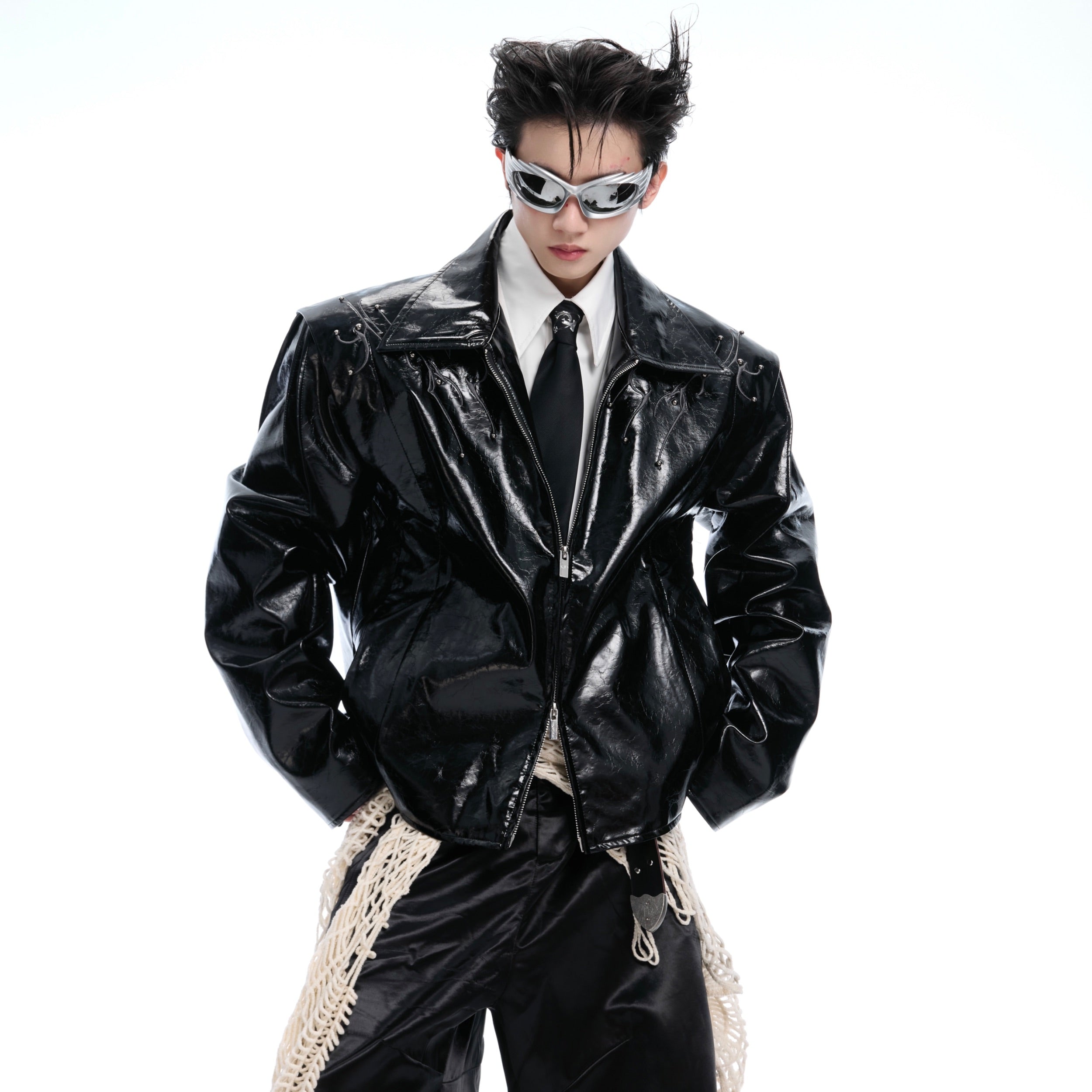 Back view showing unique embossed spine pattern and metal stud details on premium PU leather biker coat