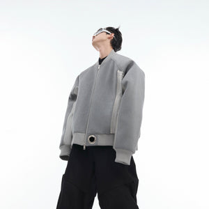 Oversized suede bomber jacket with deconstructed design, perfect for urban streetwear fashion