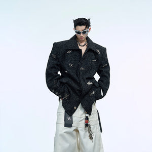 Luxury textured blazer with metallic accents and structured shoulder pads for a bold fashion statement