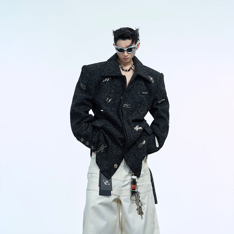 Luxury textured blazer with metallic accents and structured shoulder pads for a bold fashion statement