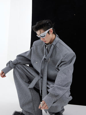 Close-up of unique tie-detail on split-design jacket, part of stylish mens hoodie streetwear outfit