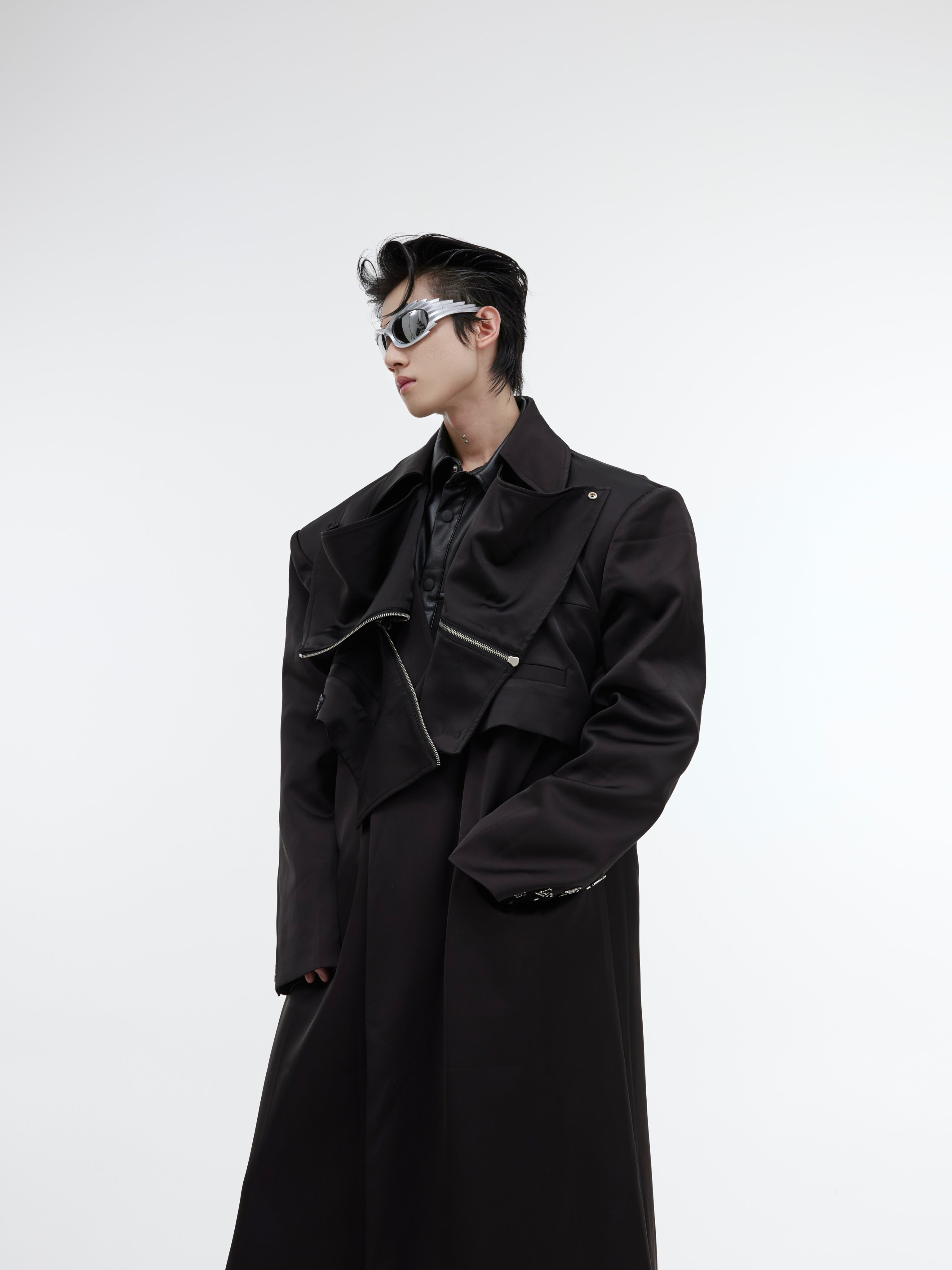 Front view of deconstructed trench coat showing adjustable placket and unique double-layer streetwear design