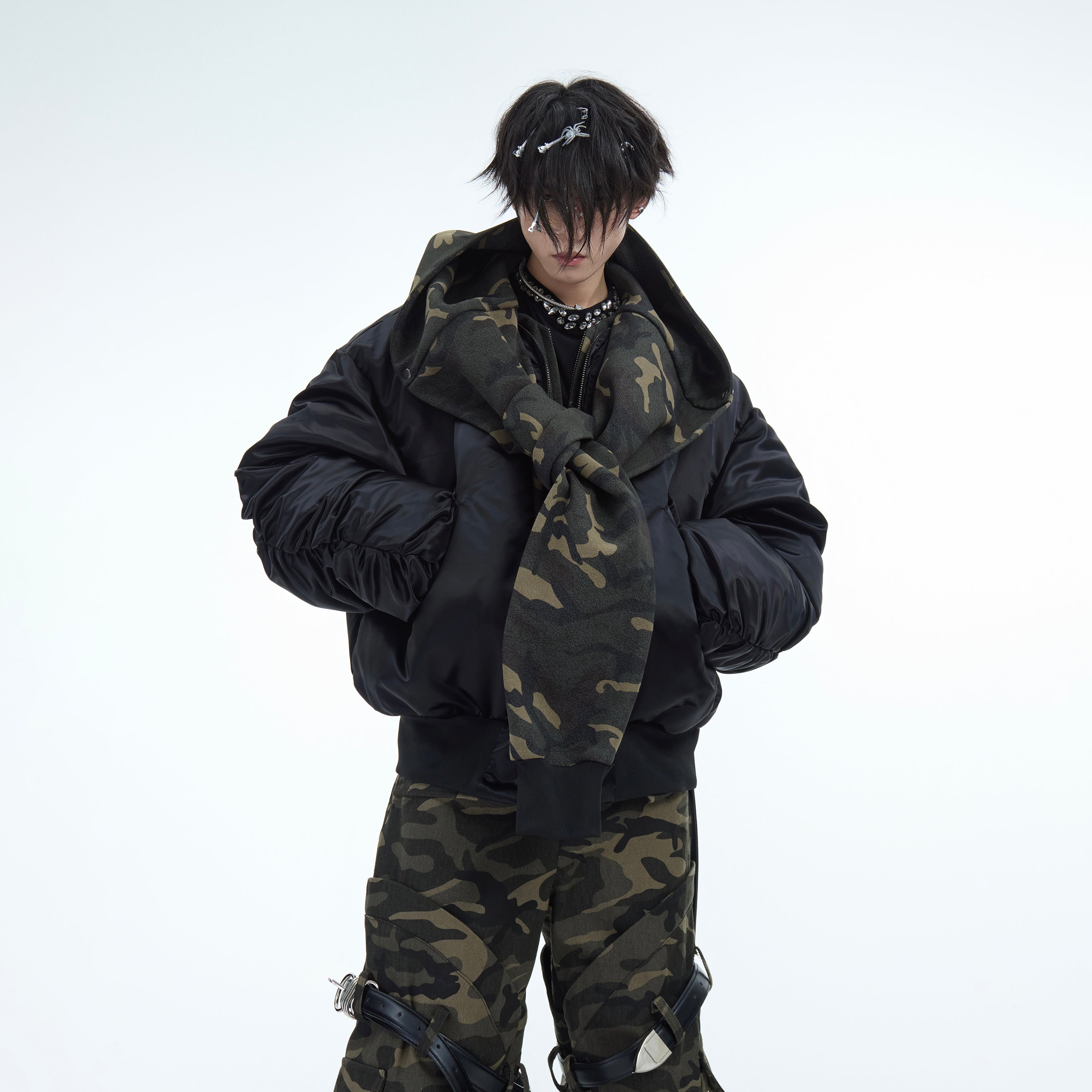 Urban camouflage hooded bomber jacket in heavyweight cotton, featuring military-style streetwear design with premium fabric