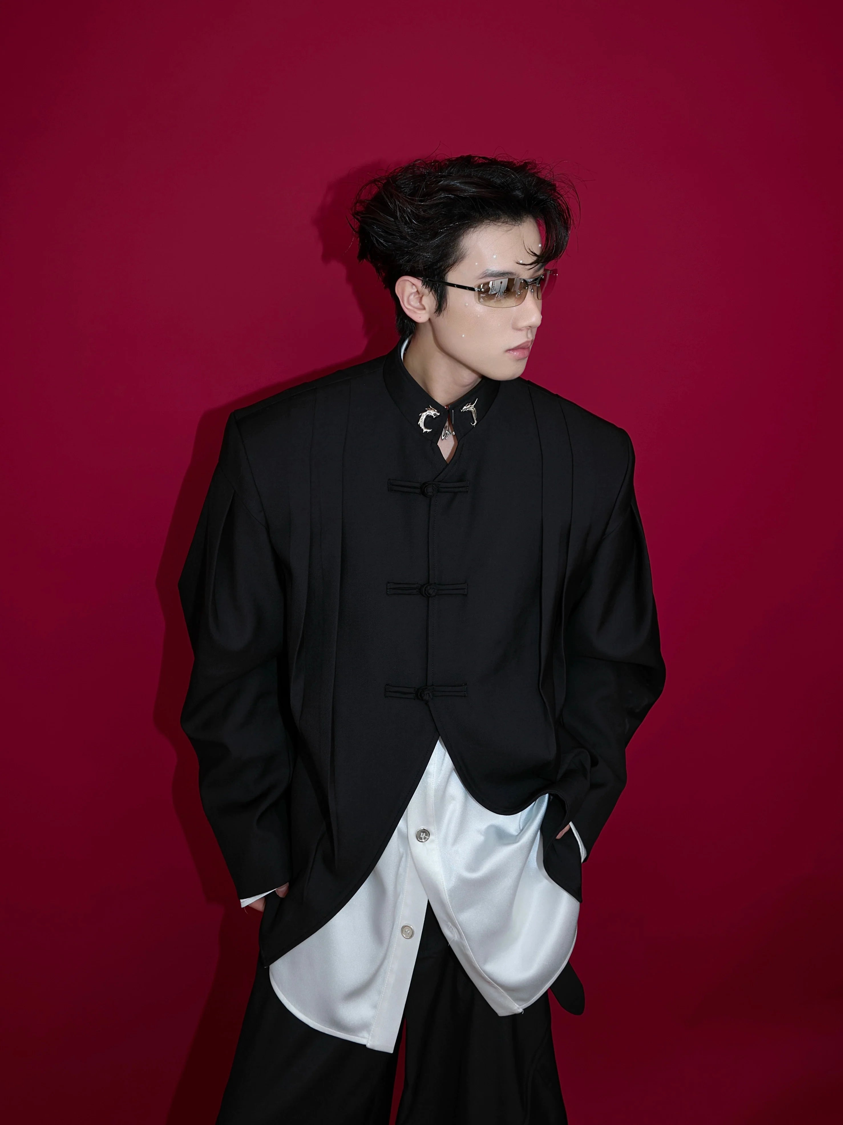 Vintage Chinese-inspired leather blazer with distinctive stand collar and button detailing, perfect for streetwear looks