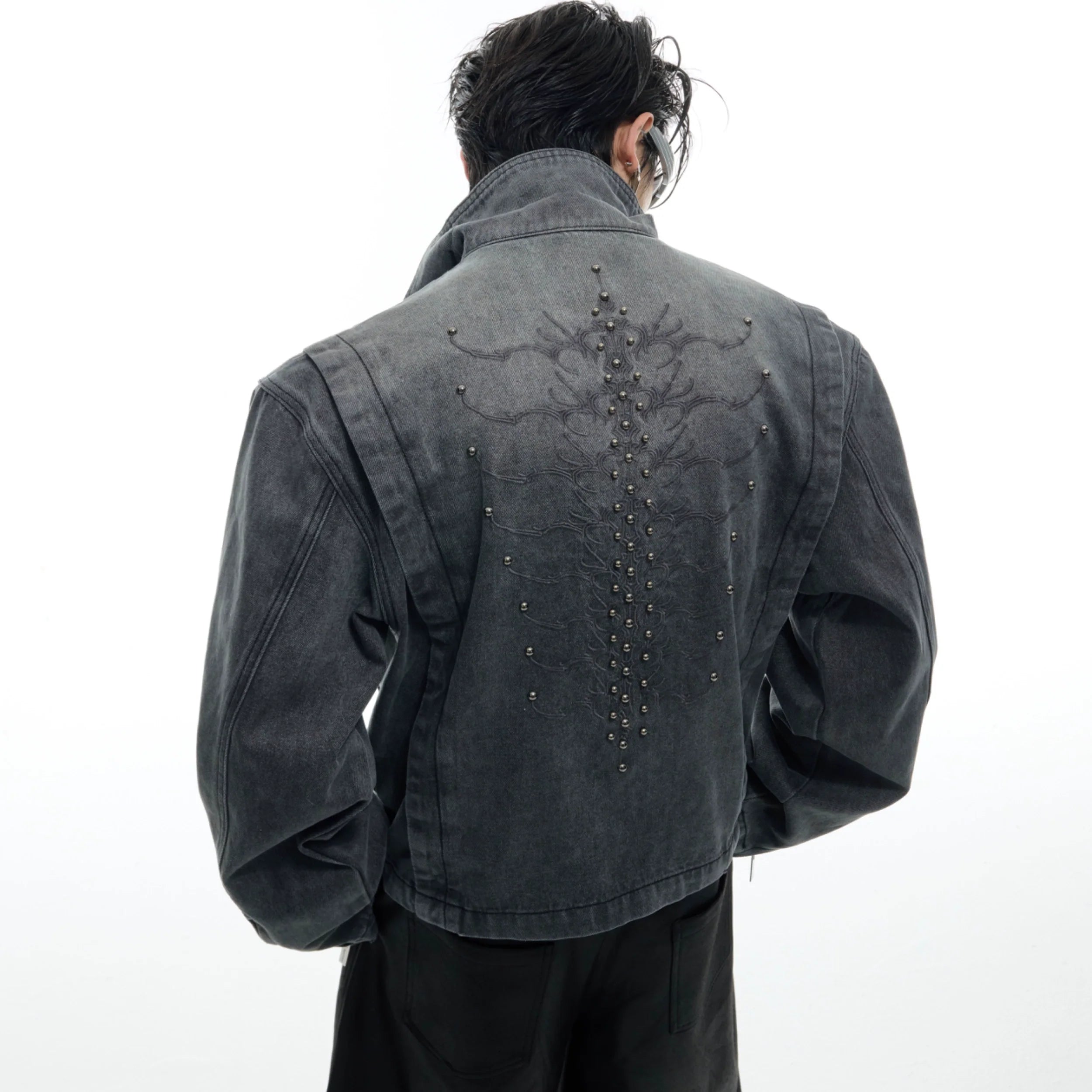 Vintage washed denim jacket featuring intricate 3D skeleton embroidery on front, streetwear essential with unique detailing