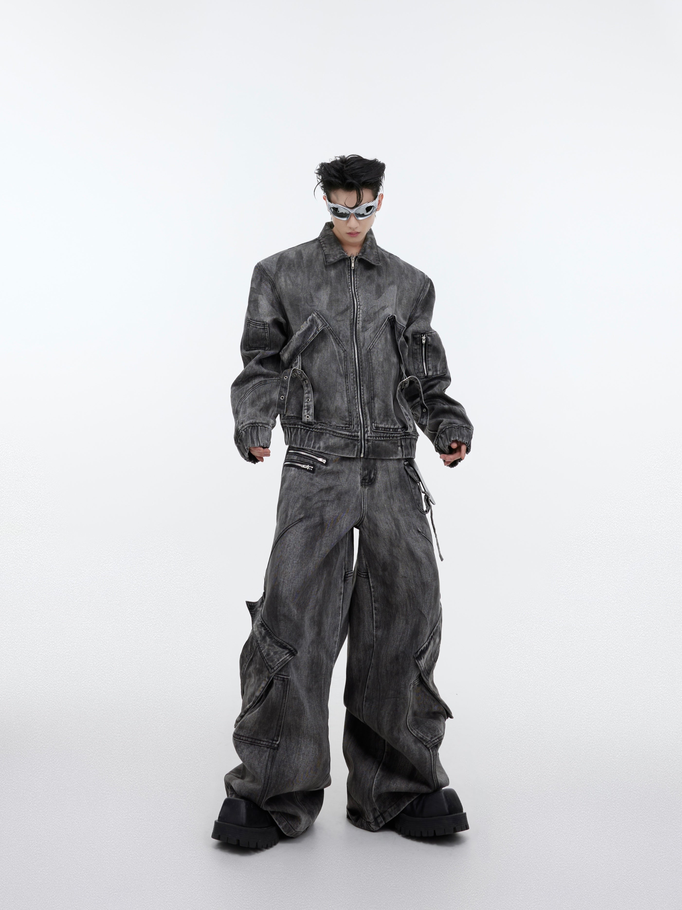 Vintage distressed denim set featuring zippered jacket and cargo pants with retro wash and edgy metal hardware