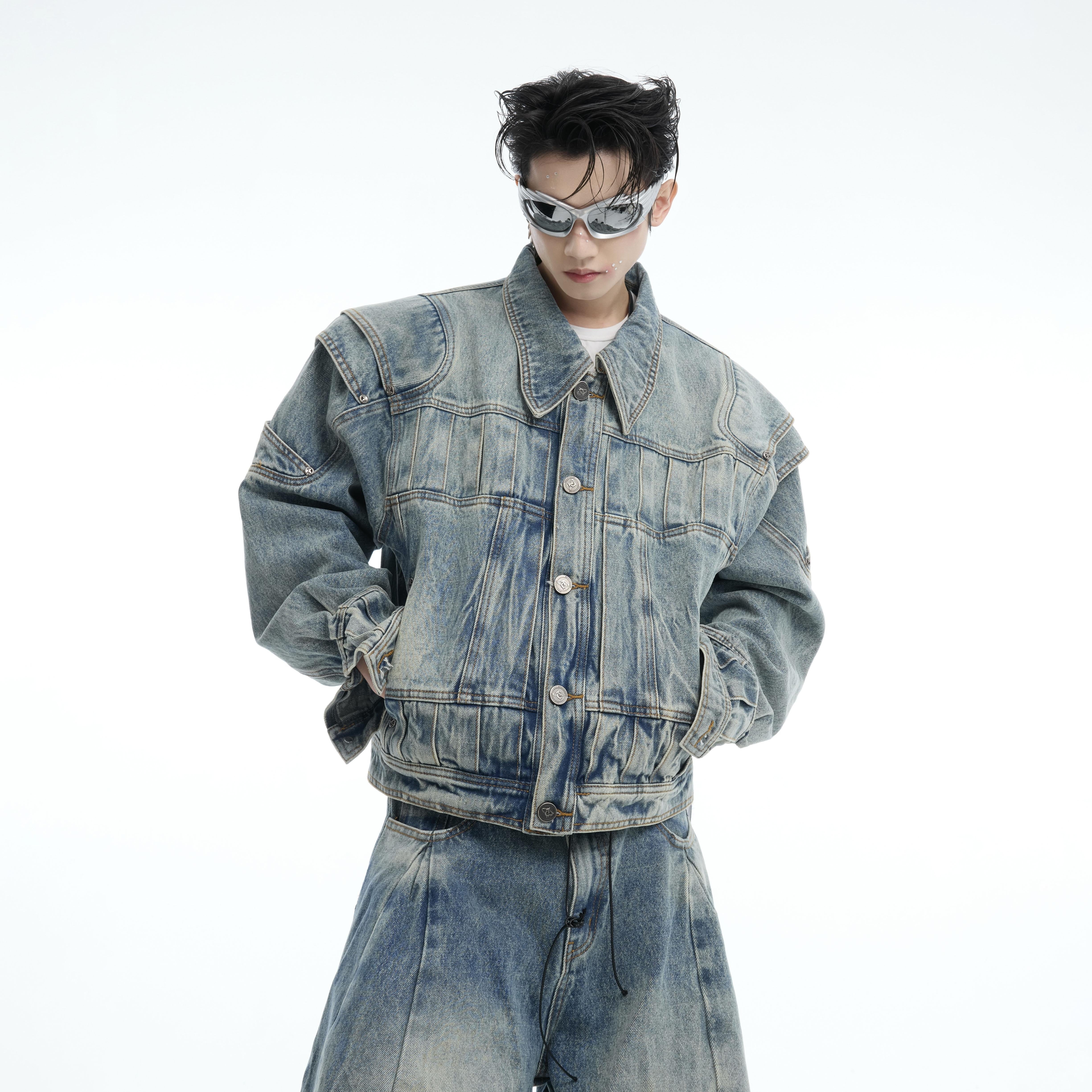 Close-up of vintage denim suit with authentic distressed wash and unique fading patterns for urban style