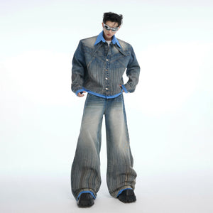 Front view of vintage distressed denim jacket showing unique patchwork design and salt-speckled wash effect