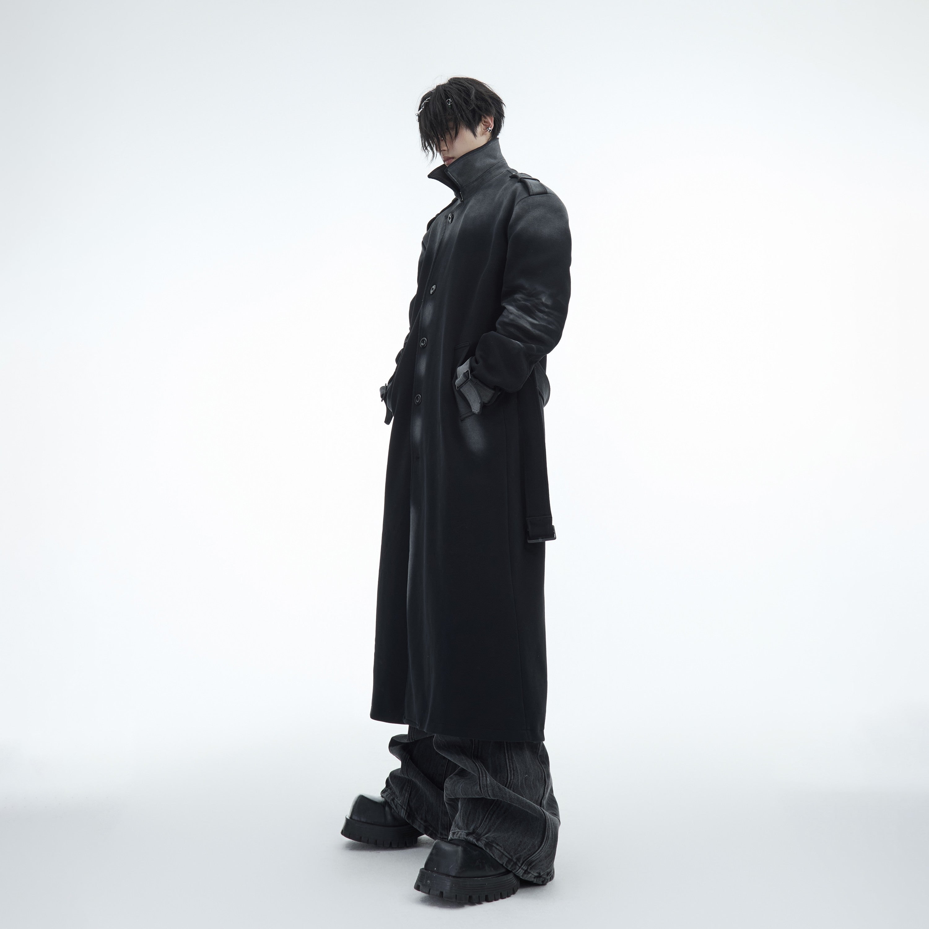 Vintage oversized distressed trench coat with urban streetwear style, featuring heavyweight fabric and unique distressing details