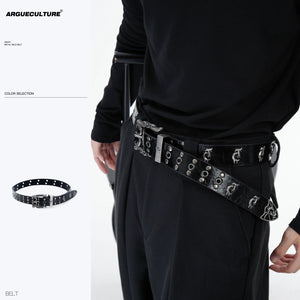 Close-up of vintage distressed metal punk belt showcasing heavy-duty buckle and authentic texture