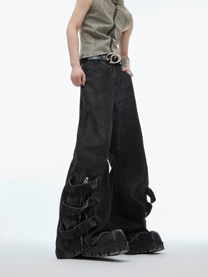 Vintage distressed tie-waist jeans with ruffle details, showcasing the baggy streetwear style and deconstructed design