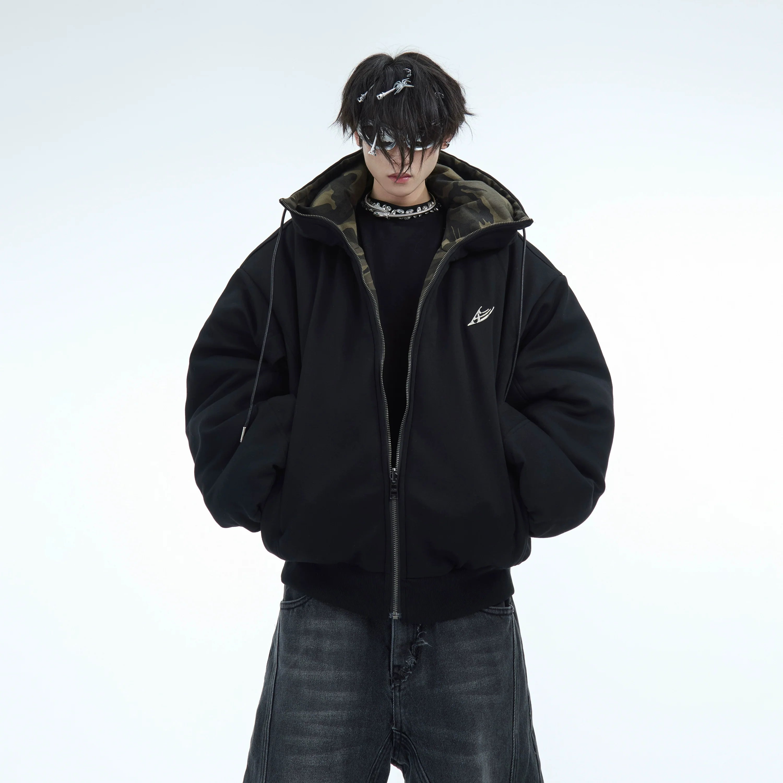 Men's vintage washed camo reversible jacket featuring military-inspired design and oversized fit for urban streetwear