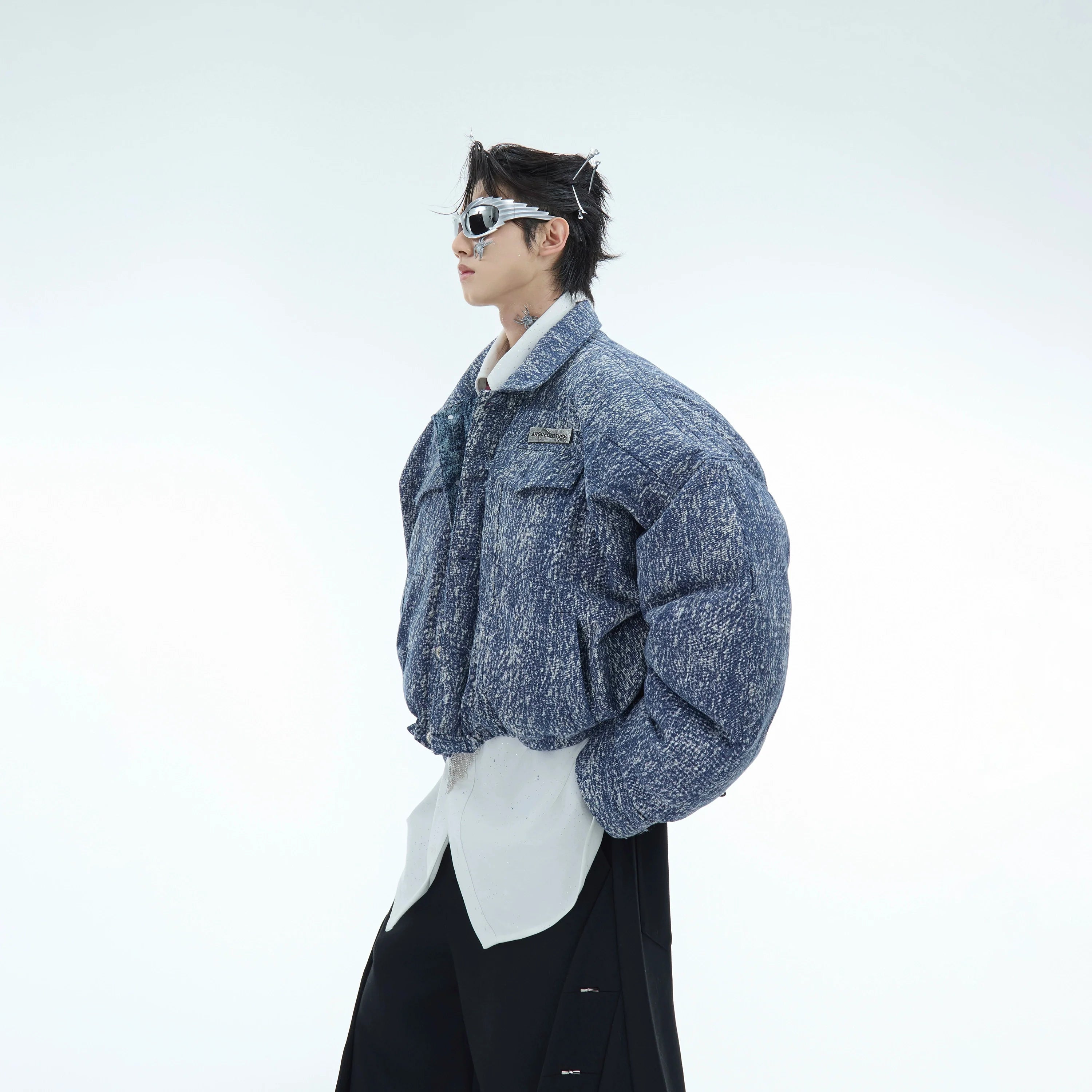 Vintage washed denim jacket with cropped cut and distressed details, perfect for streetwear outfits