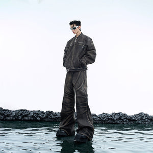 Vintage washed waxed denim jacket with quilted lining and metal hardware details, showcasing rugged streetwear style