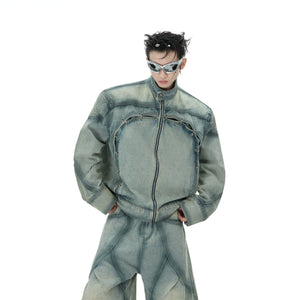 Front view of vintage-washed distressed denim set featuring unique ring buckles and abstract spray-dye patterns