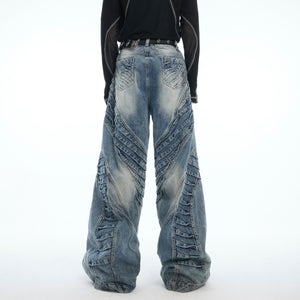 Side angle of vintage washed denim pants showcasing relaxed fit and distressed fabric texture