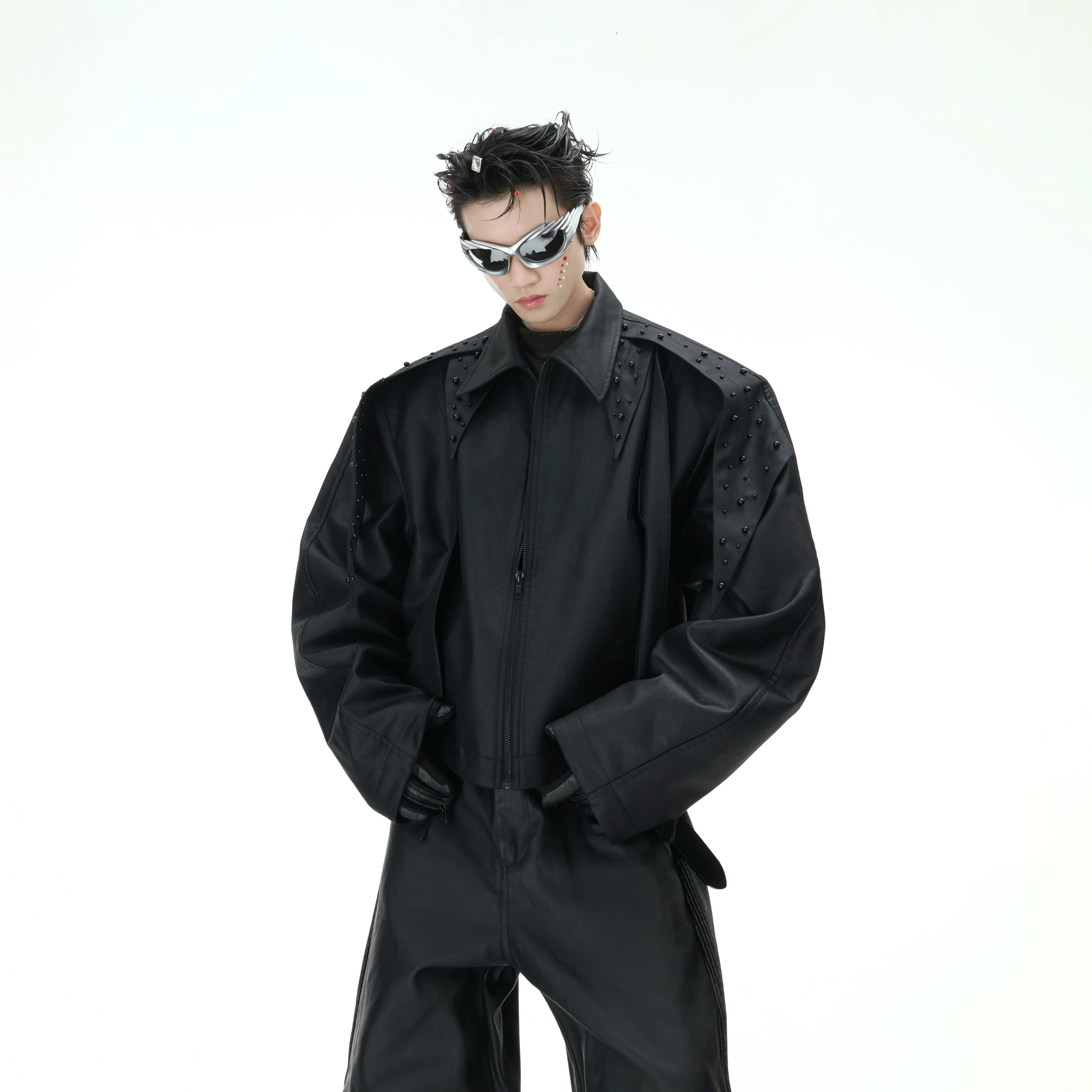 Vintage wax-dye oversized bomber jacket featuring unique split design and deconstructed biker style