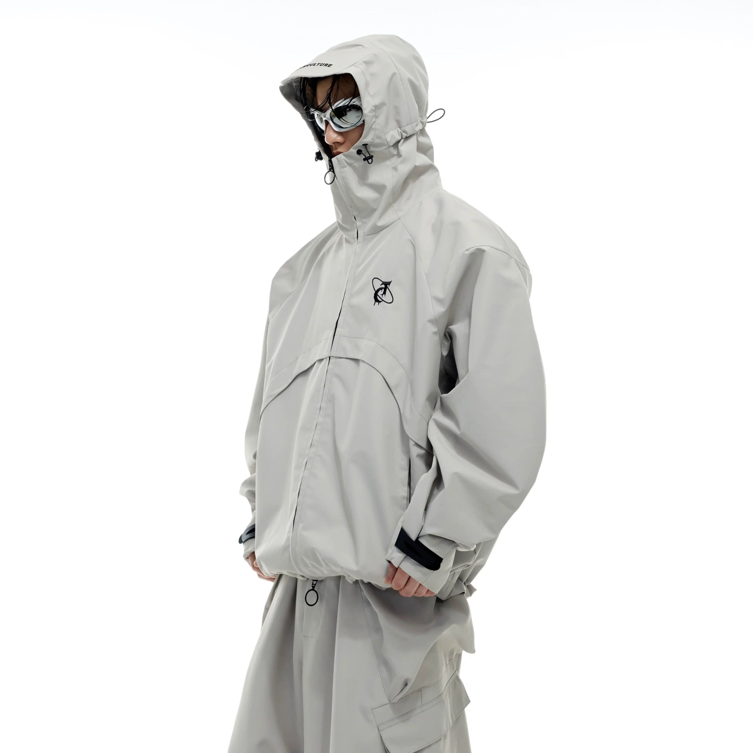 Front view of waterproof hiking jacket showing windproof design and detachable lining for versatile outdoor use