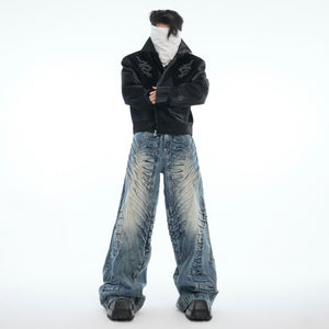 Front view of wide-leg jeans showing double pleated design and distressed detailing for fashion-forward look