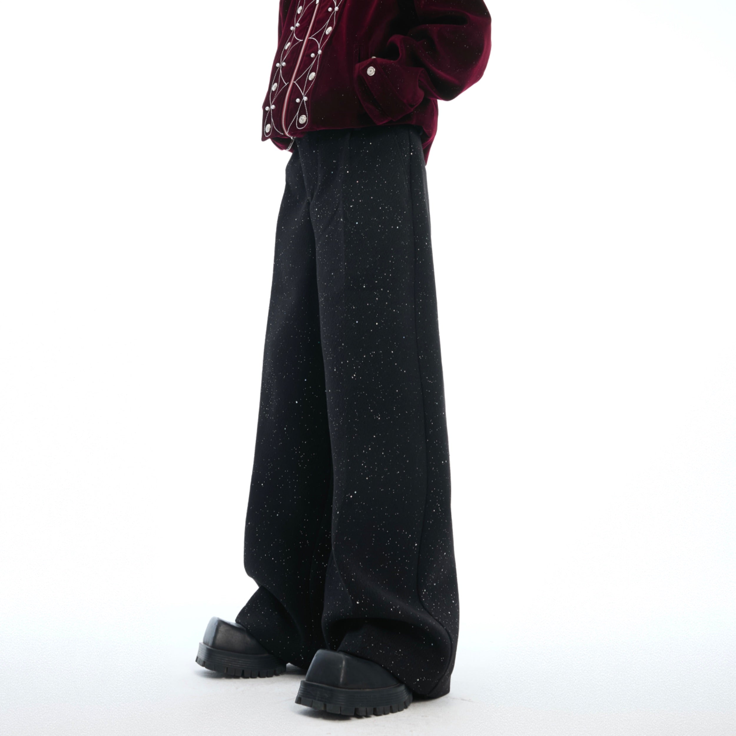Front view of glittery loose fit casual pants showing the all-over sparkle design and high waist