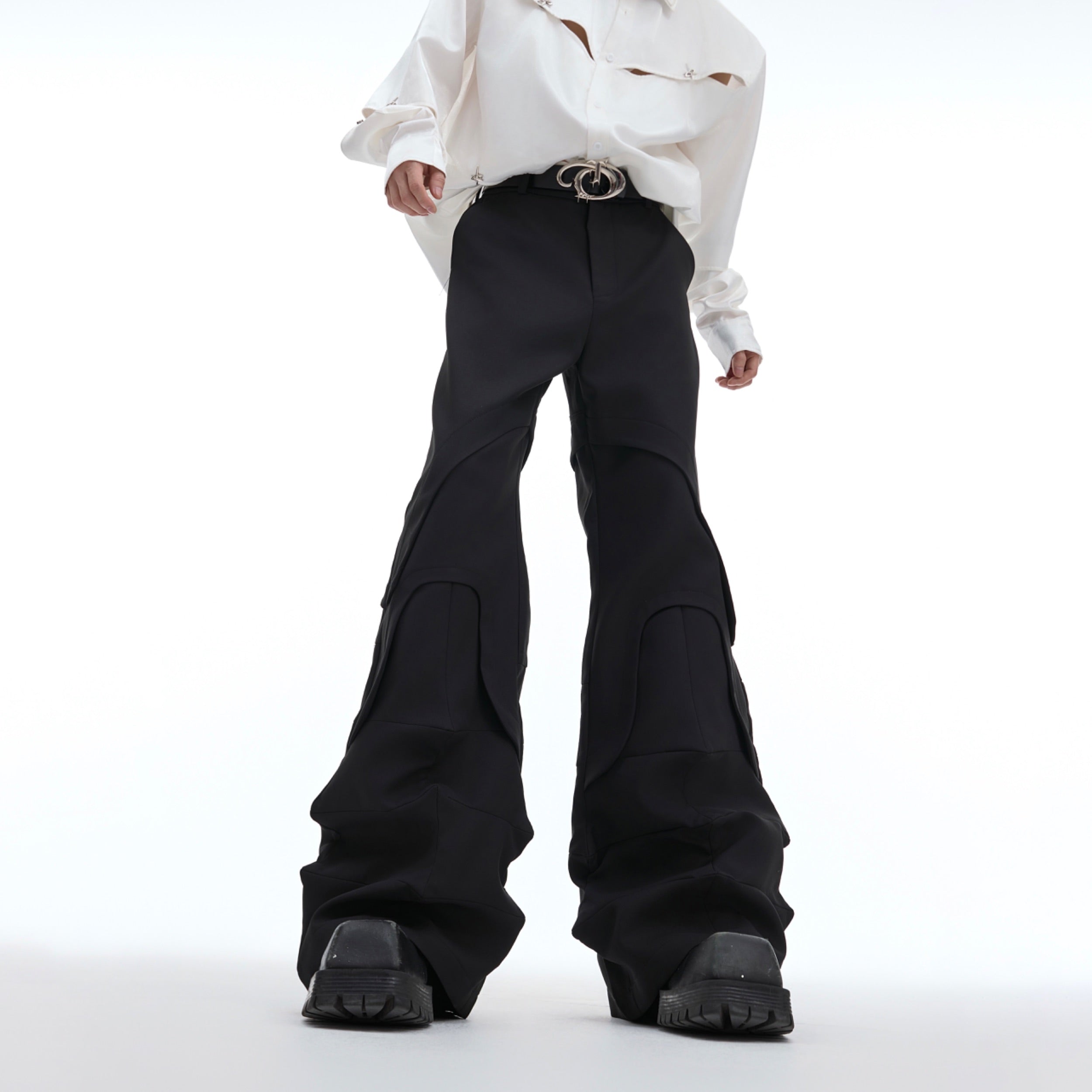 Deconstructed pleat-design wide-leg trousers showcasing avant-garde streetwear style with asymmetrical silhouette