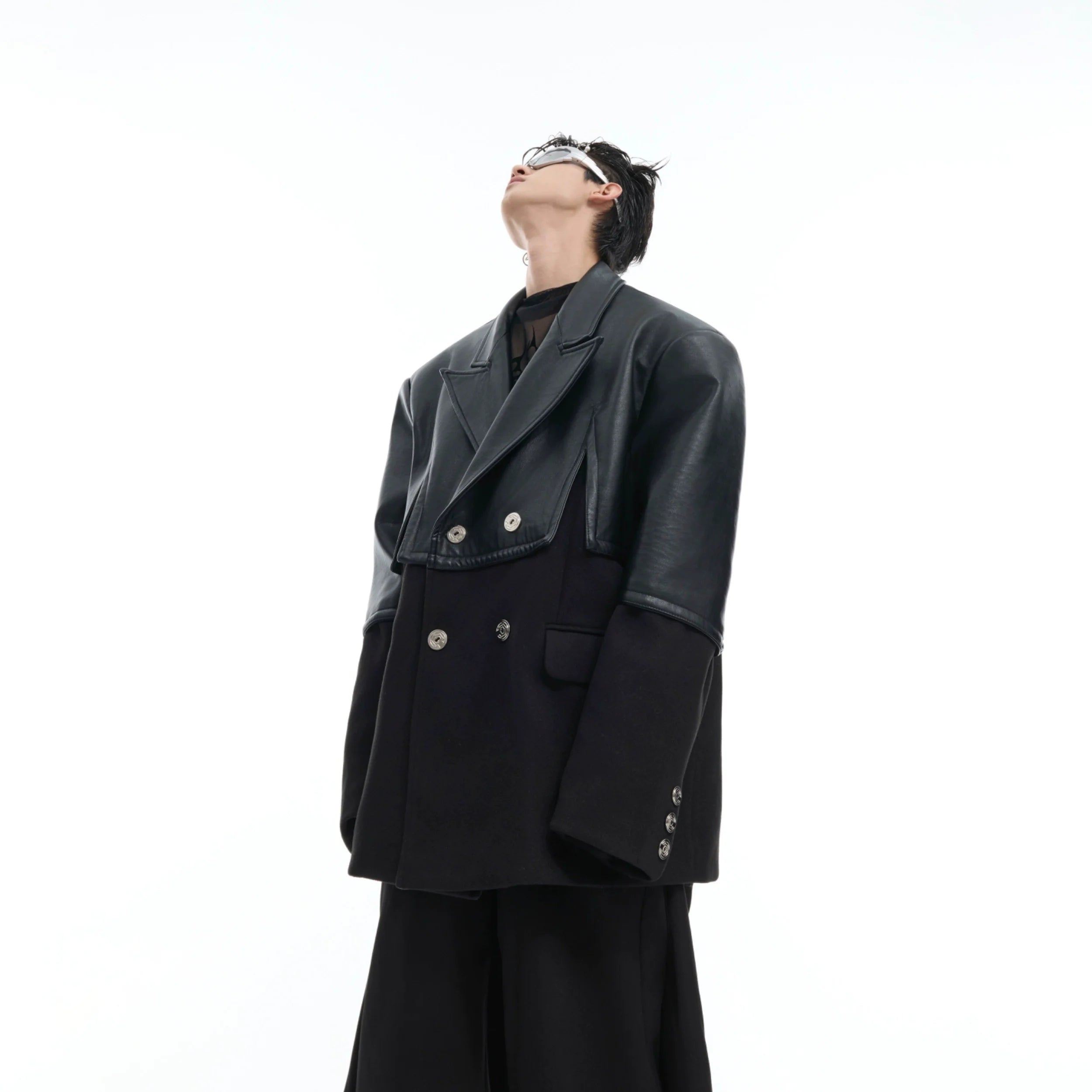 Deconstructed wool-PU leather blazer with asymmetrical design, featuring premium splicing of leather and wool fabrics