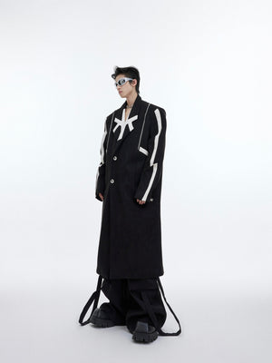 Oversized deconstructed wool trench coat with bold asymmetrical slits, showcasing avant-garde streetwear style